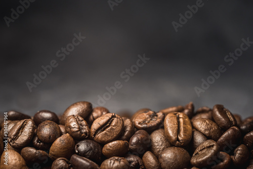 aroma coffee beans on burlap background for your text