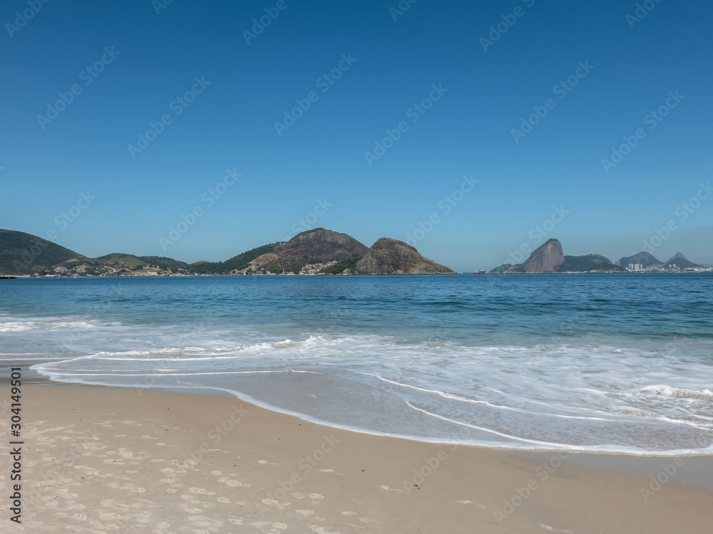 Sugar Loaf Mountain, Corcovado, Museum of Contemporary Art  on the horizon, front view, Icaraí, in the city of Niterói, Rio de Janeiro, Brazil. Beautiful landscape.