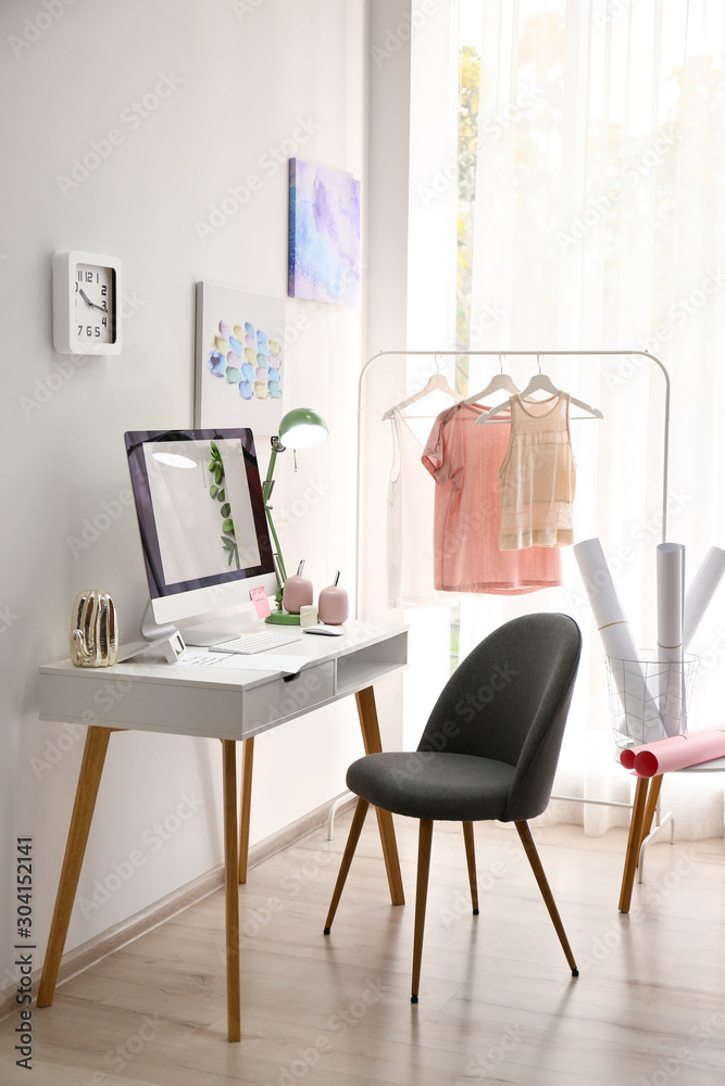 Designer's workplace with modern computer on table