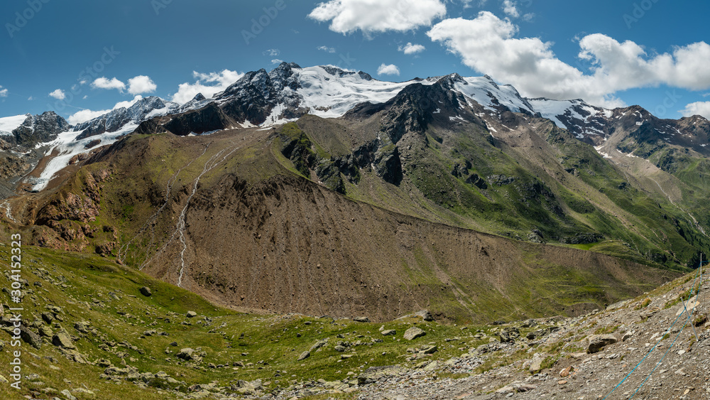 Valley and mountains near Melago on a sunny day in summer Valley and mountains near Melago on a sunny day in summer