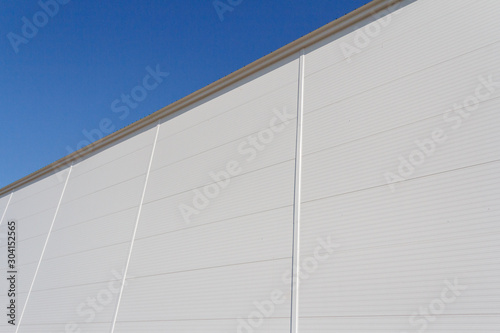 Part of the wall of the building made of sandwich panels. Sandwich panels with insulation in the construction of buildings.