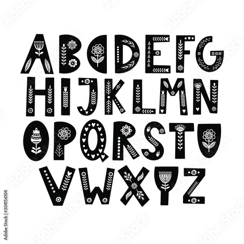 Alphabet hand drawn letters in folk style. Scandinavian style font. Capital letters with ethnic decorative leaves, flowers. Vector illustration.