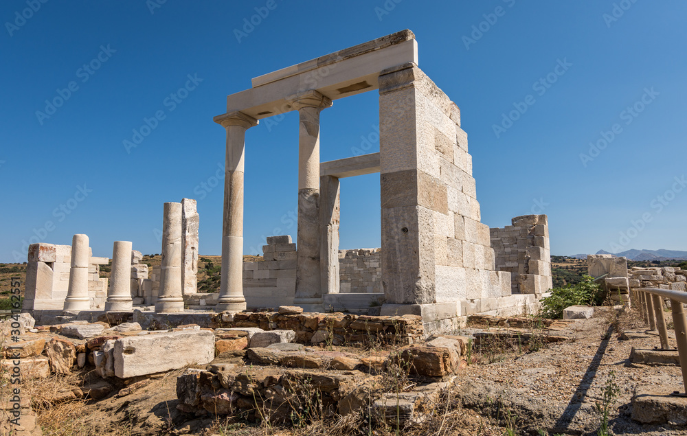 Sangri, Naxos / Greece - July 13, 2019: Tourists visting Demeter's temple and ruins at Sangri village, Naxos, Greece