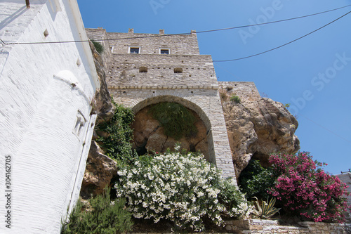Fototapeta Naklejka Na Ścianę i Meble -  Wall on  a cliff in Apiranthos, the marble village in Naxos, Greece
