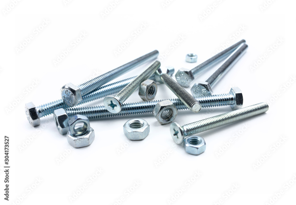 Nuts and bolts close up on white isolated background Nuts and bolts close up on white isolated background