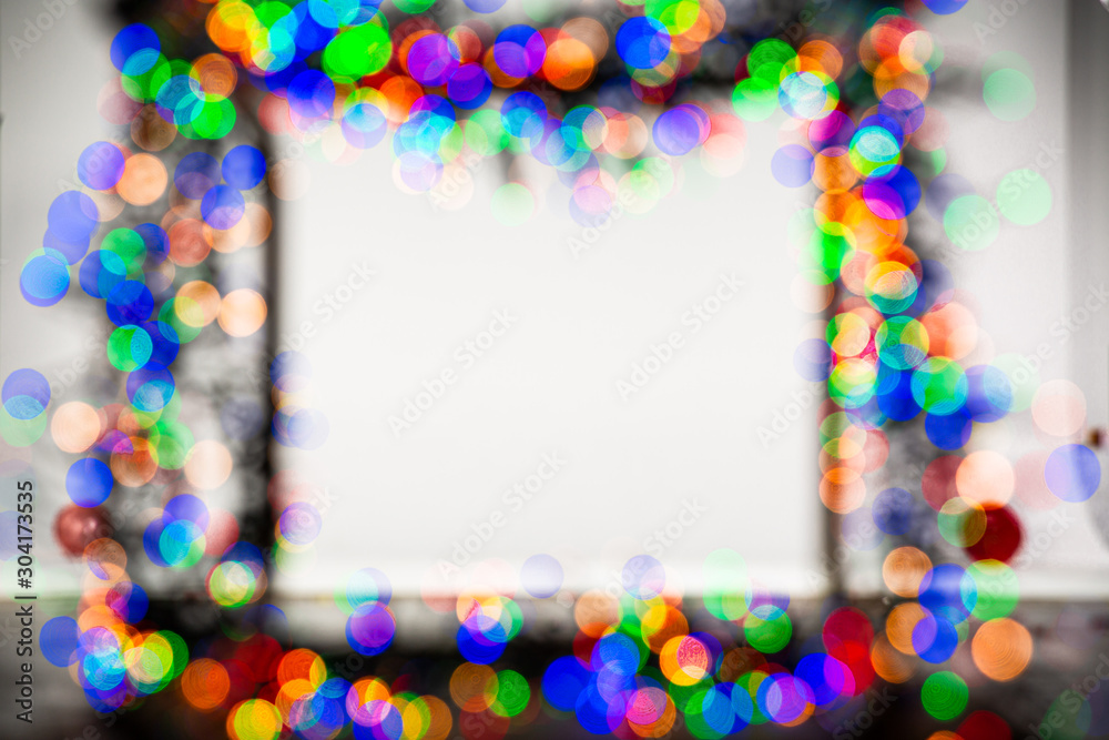Fototapeta premium Frame made of Christmas blur colorful light on the background white color