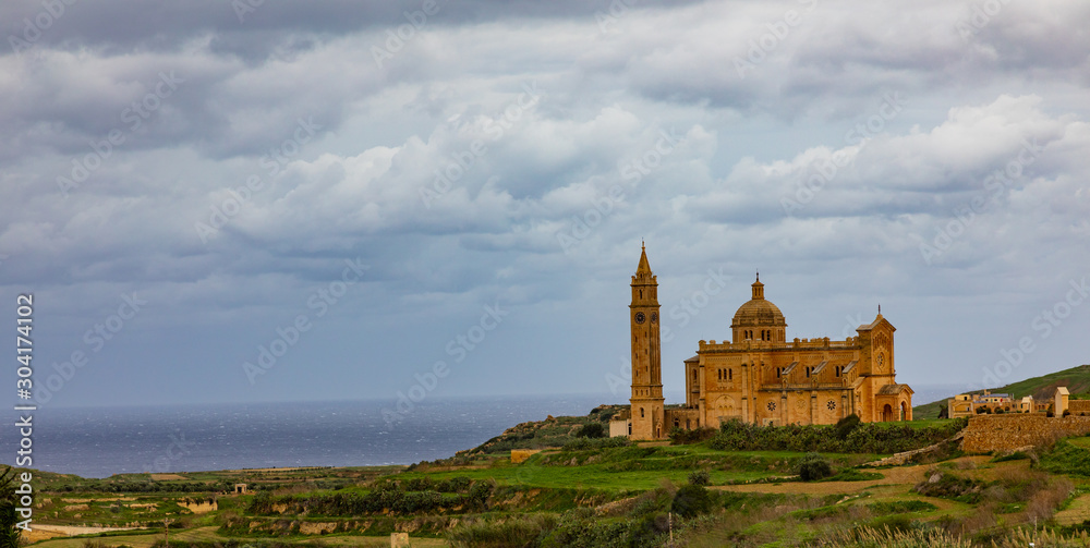 Panorama with church on the coast of Gozo (Malta)