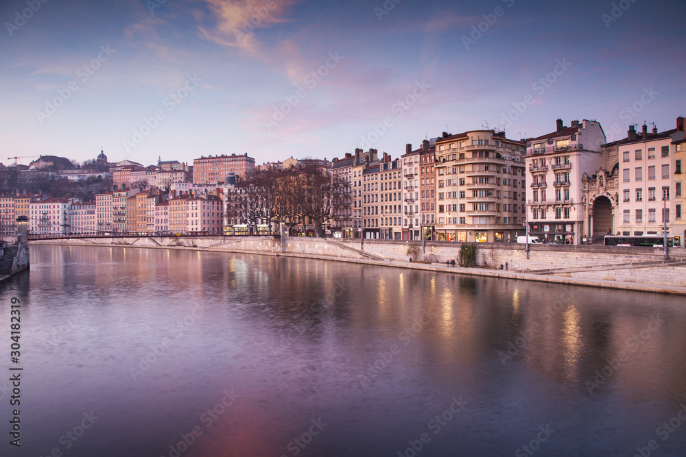 Lyon buildings along river Saone at sunset