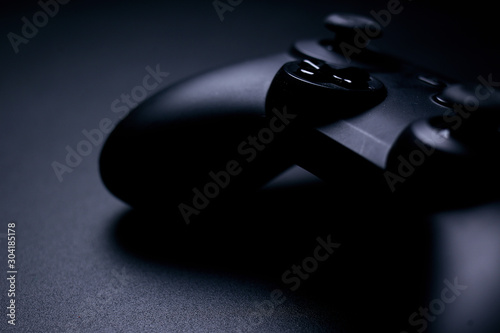 video game controller isolated on black background