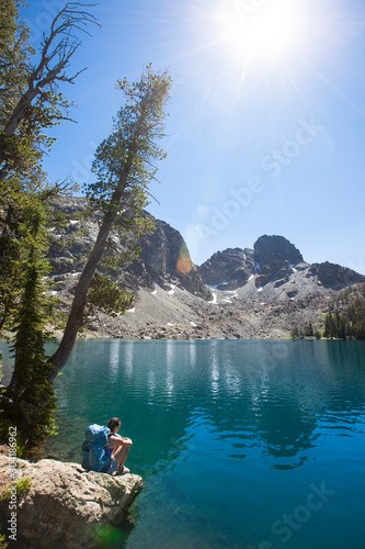 A woman Mountains in Central Idaho.  He Devil sits prominantly in the background. photo