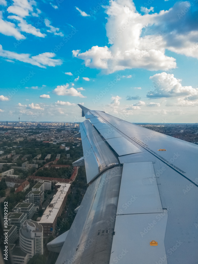 airplane wing over berlin
