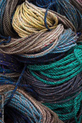 Close Up of Coils of Colorful Rope Stacked on Lobstering Dock