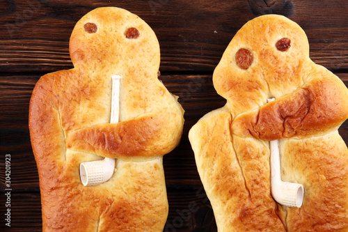 stutenkerl or weckmann. baked traditional german pastery. photo