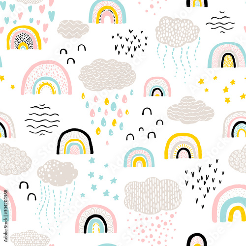 Rainbow pattern. Childish vector seamless pattern with sky, clouds, rain, stars. Cute hand-drawn illustration in scandinavian style. pastel colors ideal for baby clothes, textiles.