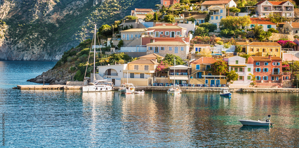 Beautiful landscape with bay and colorful buildings on the background in the town of Asos , Greece, Kefalonia. Wonderful exciting places. Panorama. Amazing Greece - picturesque colorful village