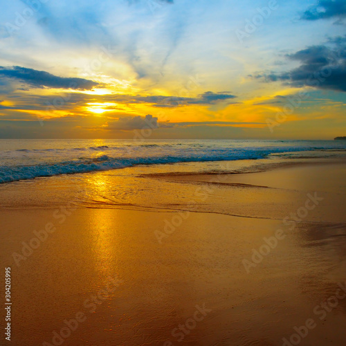 Fototapeta Naklejka Na Ścianę i Meble -  Beach of the sea and beautiful sunrise.