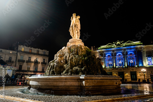 Fotografie View on the statue of Three Graces with Opera building on the background in Mont