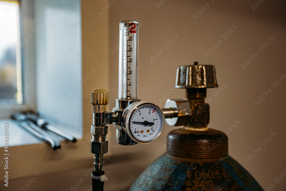 Gas cylinder with pressure gauge connected with pipe Stock Photo ...