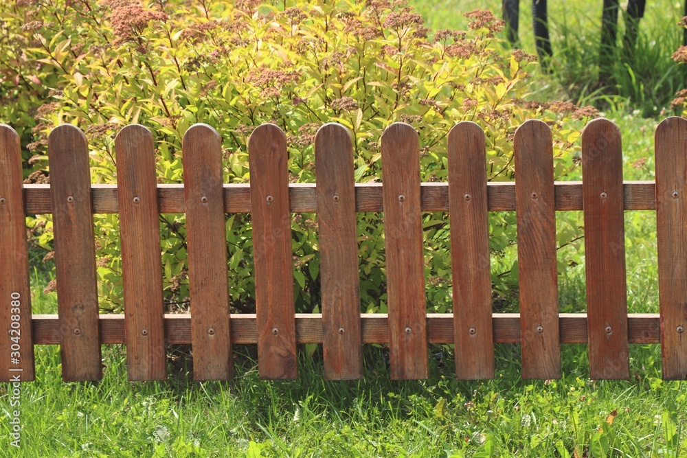 close-up of brown wooden protective fence decorative fence for garden close-up of brown wooden protective fence decorative fence for garden