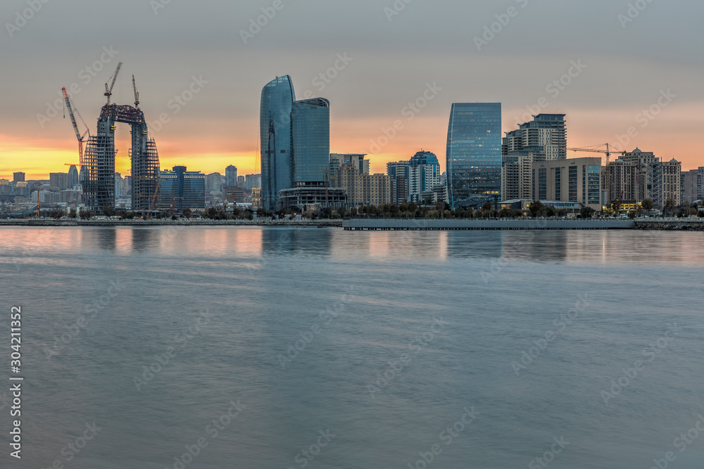 Obraz premium Panorama of the seaside boulevard in Baku at sunset day