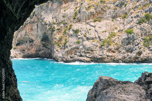 Beautiful famous bay of Sa Calobra on the island of Mallorca, Spain. Turquoise sea, rocks. Travel to the Balearic Islands.