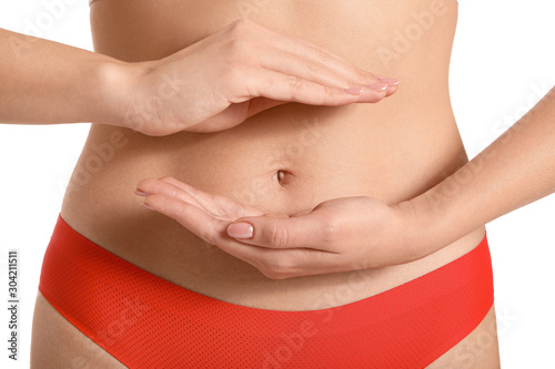 Wallpaper Mural Young woman on white background, closeup. Gynecology concept Torontodigital.ca