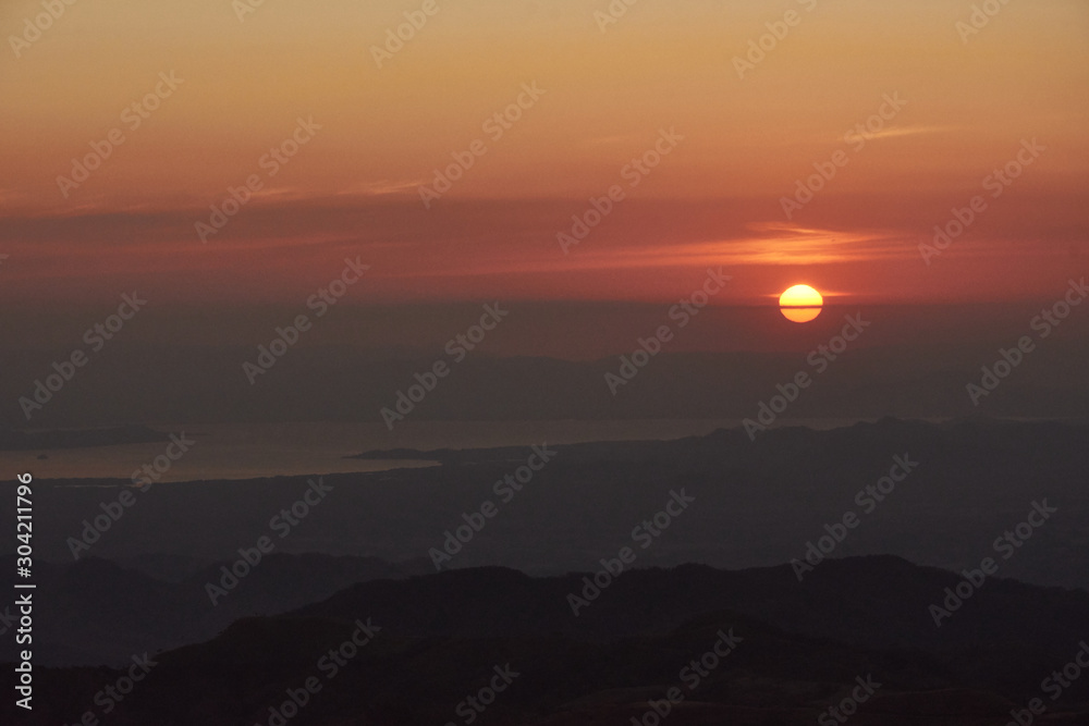 Sunset over the Guanacaste Peninsula, the Gulf of Nicoya and the Colorado Gulf from Monteverde. Costa Rica