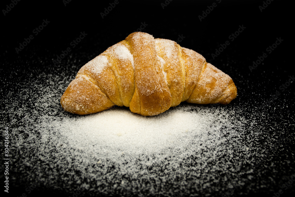 croissant bañado en azúcar