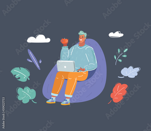 Man sitting on a bean bag chair with laptop