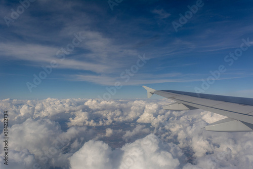 Close Up of Wing of an Airplane Flying