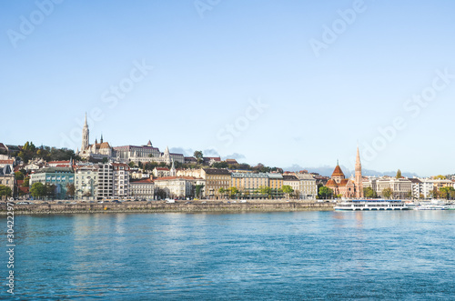 Danube river in Budapest, Hungary. The historic old town in the background with famous Matthias Church or Fishermans Bastion. Cityscape of the Hungarian capital. Tourist destinations