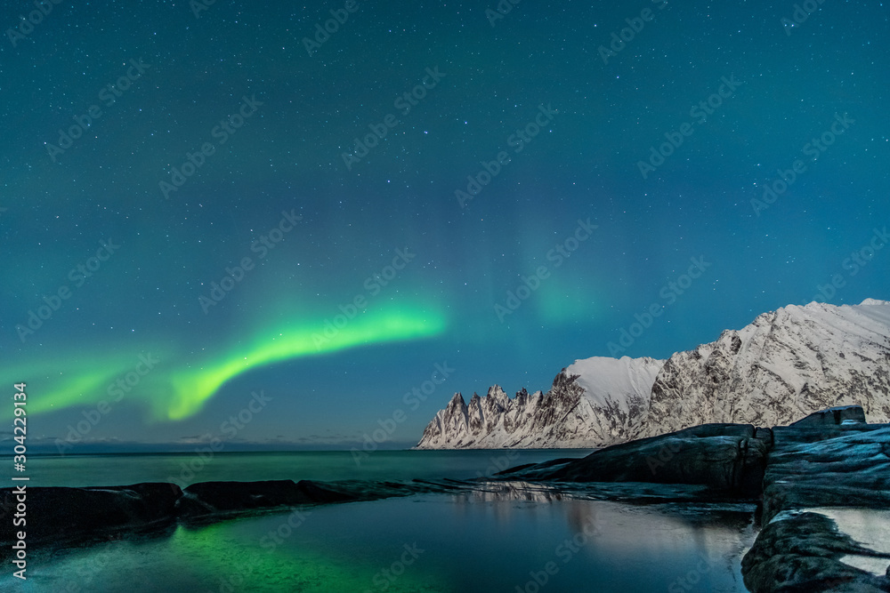 Northern lights, Aurora Borealis, Devil Teeth mountains in the background, Tungeneset, Senja, Norway