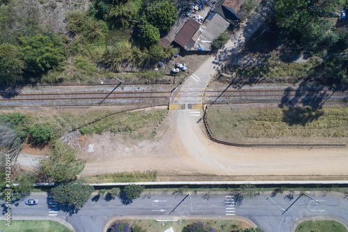 Dirty road, concrete road and railway