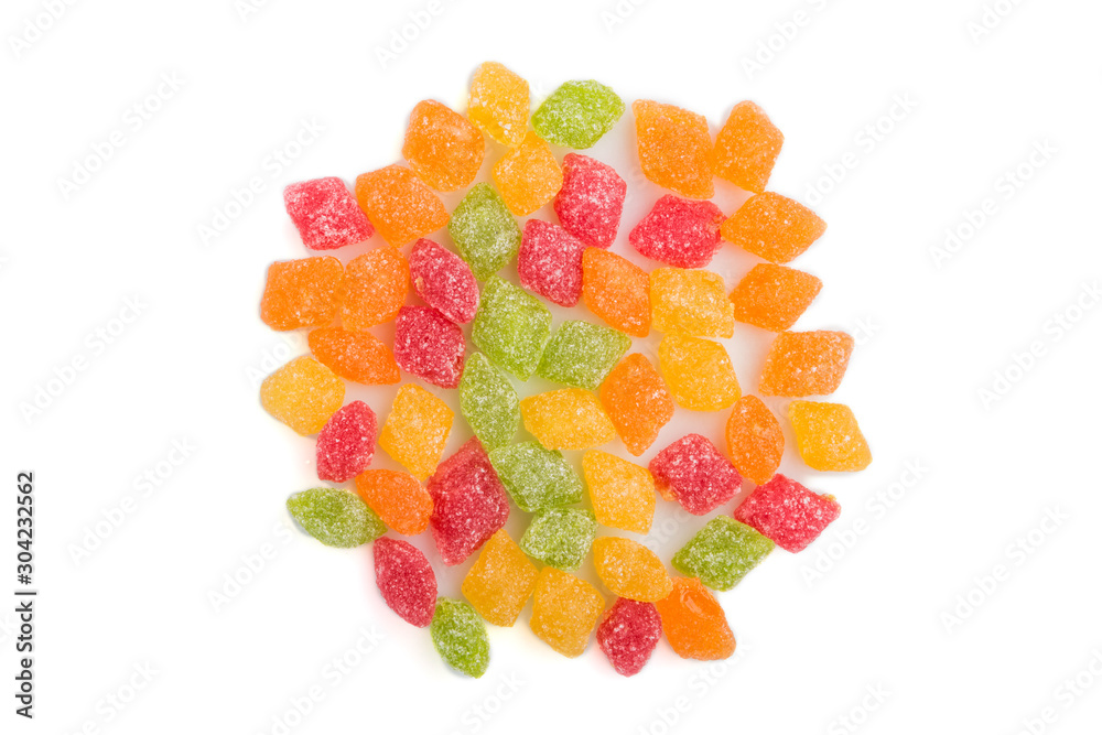Pile of multicolored candies isolated on white background. close up, top view. Pile of multicolored candies isolated on white background. close up, top view.