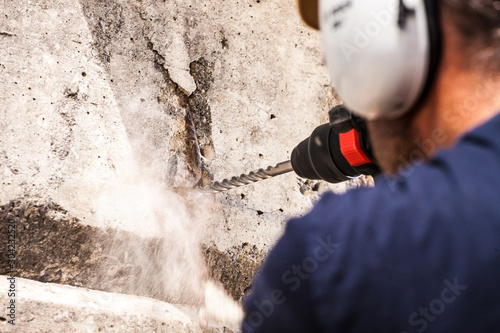 power drill drilling through hard .concrete