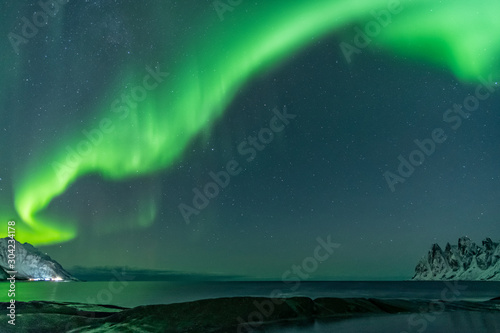 Northern lights, Aurora Borealis, Devil Teeth mountains in the background, Tungeneset, Senja, Norway © reisegraf
