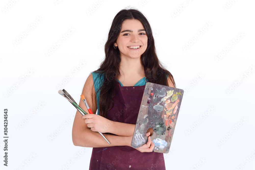 Young woman painting with brush. Young woman painting with brush.