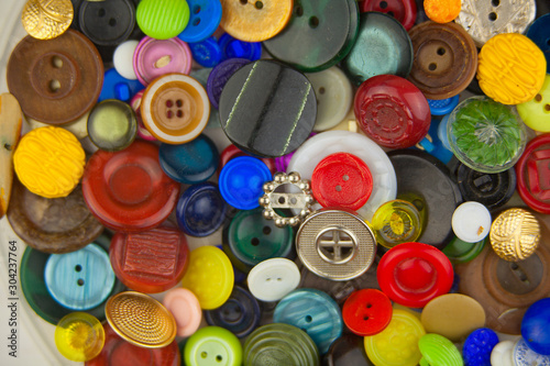 beautiful abstract sewing background of buttons
