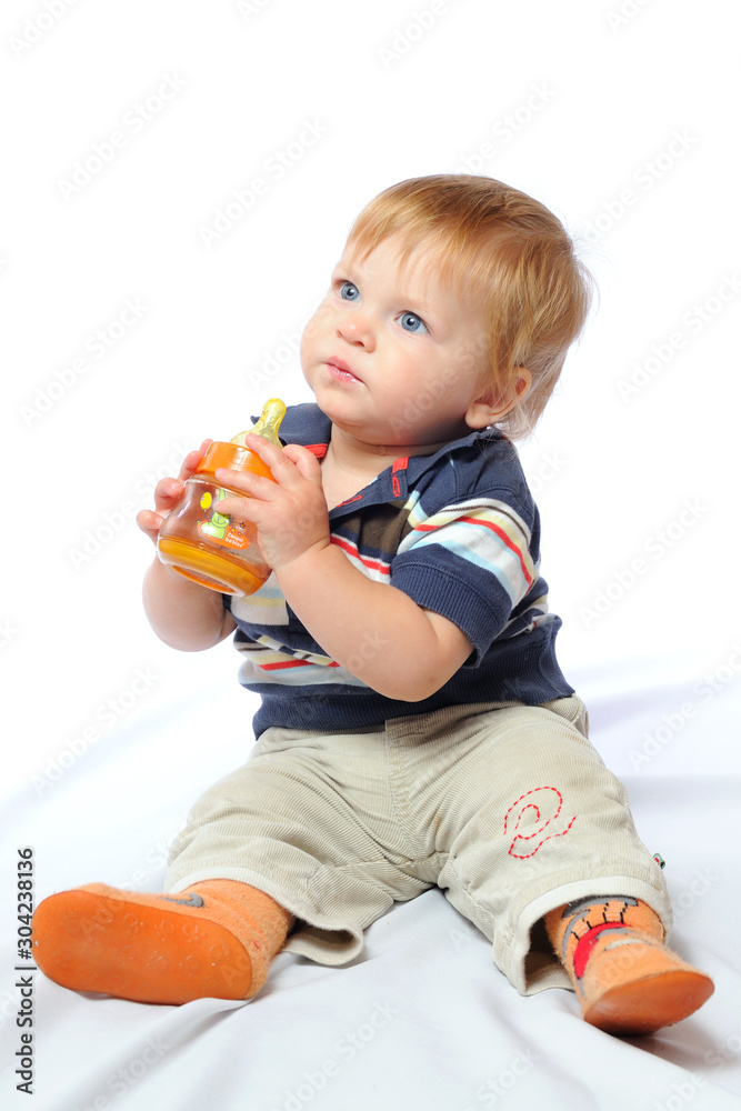 Little toddler drinks water from bottle Little toddler drinks water from bottle
