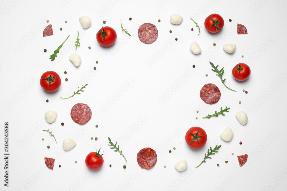 Composition with fresh ingredients and space for text on white background, top view. Pepperoni pizza recipe Composition with fresh ingredients and space for text on white background, top view. Pepperoni pizza recipe