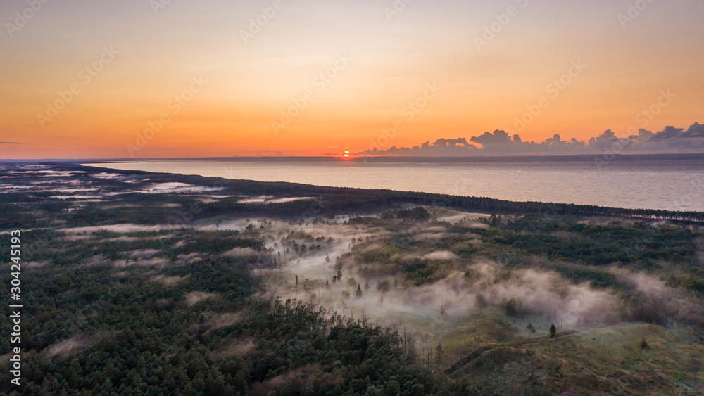 Misty sunset over Baltic sea