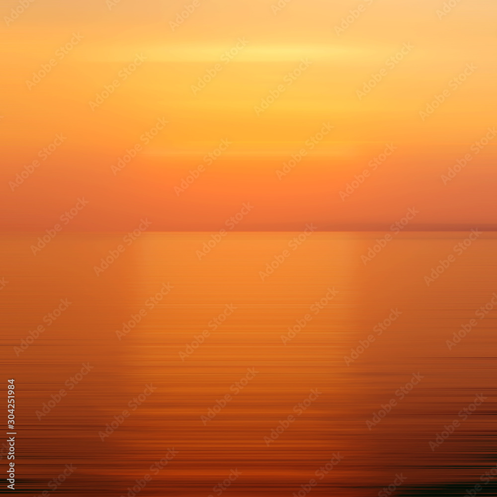 Abstract orange background motion blur sunset on the sea