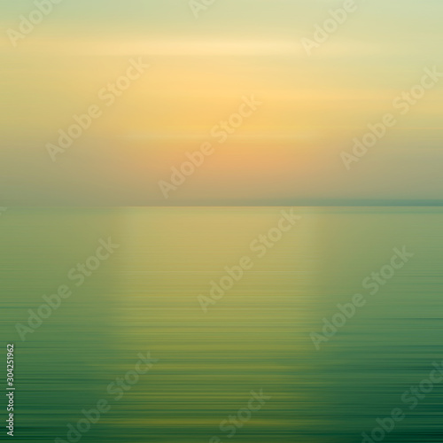 Abstract blue background motion blur sunset on the sea
