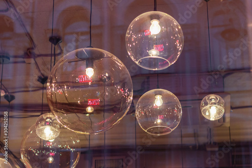 Wallpaper Mural transparent round lampshades with incandescent bulbs. design illumination Torontodigital.ca