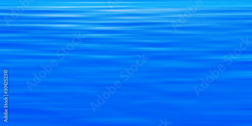 Blue blurred abstract background of water