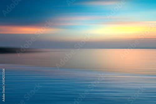 Motion blurred background of refraction in the sea