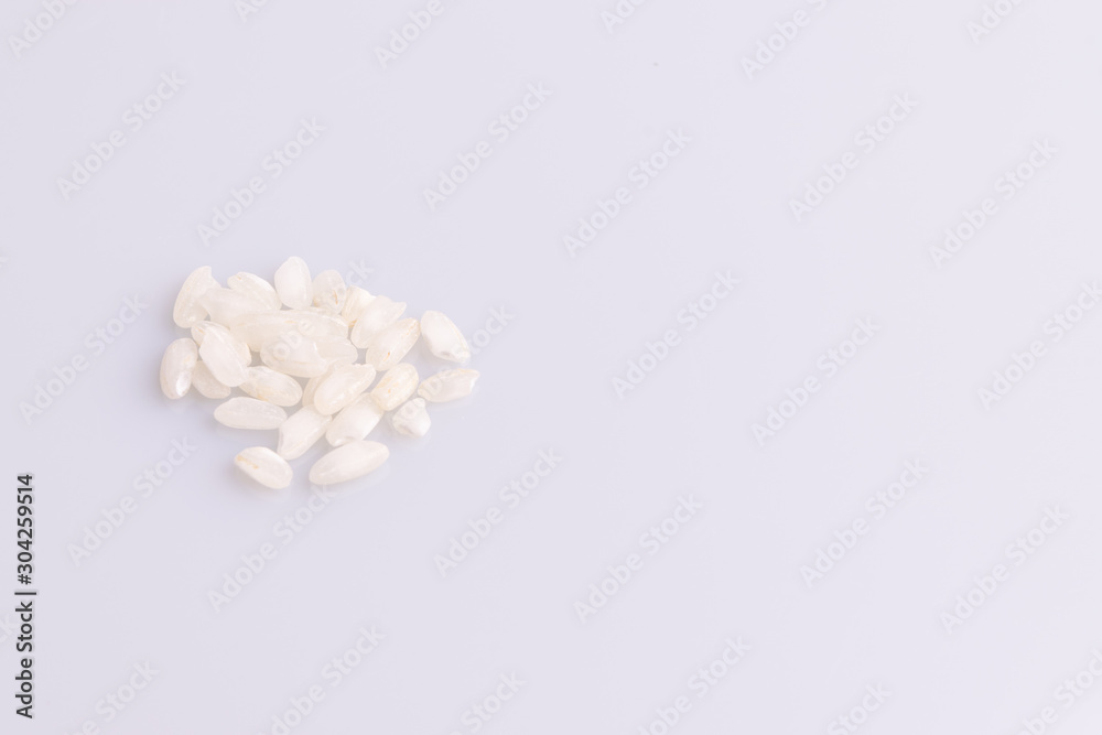 Italian Risotto rice on white background. Copy Space. Soft light. Latin term 