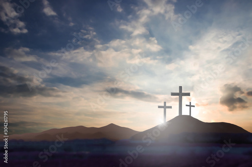 cross the crucifixion on the mountain jesus christ with a sunset background