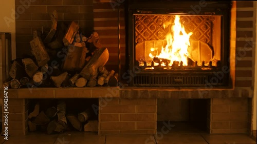 Burning fireplace. Background for the design of New Year's greetings. Christmas.	