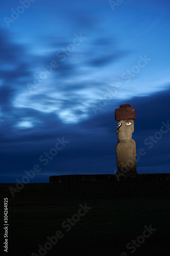 Ahu Ko Te Riku moai with eyes in Rapa Nui at night, long exposure. Easter Island. Chile photo